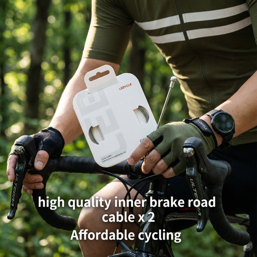 Cyclist on a road bike holding a pack of two inner brake cables
