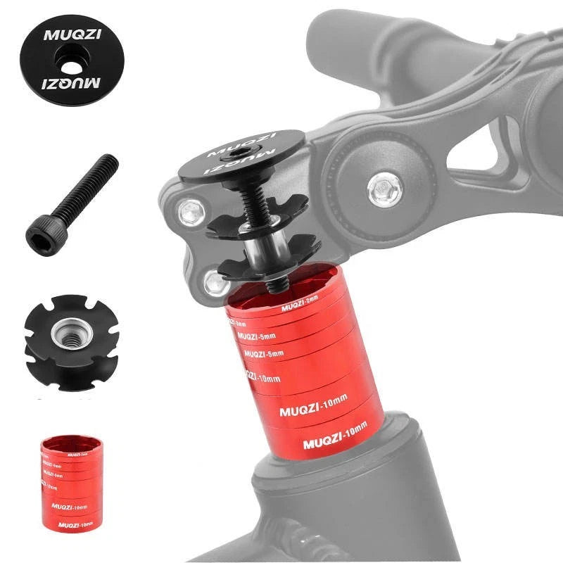 Red headset spacer fitted to a fork steerer underneath the stem