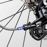 Blue alloy cable end cap fitted at the rear derailleur