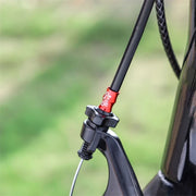 Red alloy cable end cap fitted where the cable enters the frame