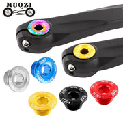Rainbow, gold and blue crank bolt caps fitted to black crank arms