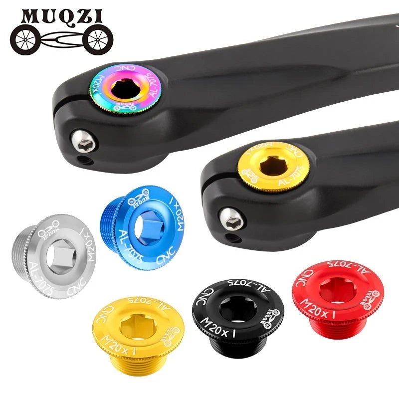 Rainbow, gold and blue crank bolt caps fitted to black crank arms
