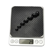 A single spiral cable protector weighed on scales at 2.9 grams