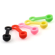 Bleed nipple covers in black, red, green, yellow and pink