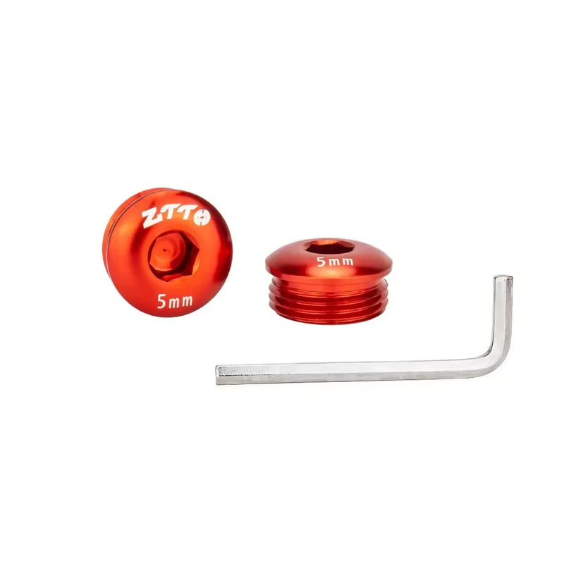 Red M14 pedal end caps with the supplied Allen key