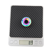 Rainbow crank bolt cap weighed on digital scales at 8.9 grams