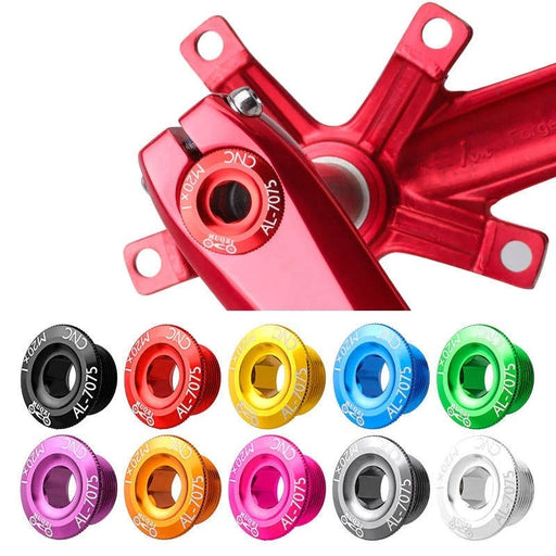 Red crank bolt cap fitted to a crankset with the full colour range below it