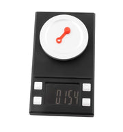 Red bleed nipple cover weighed on precision scales at 0.154 grams